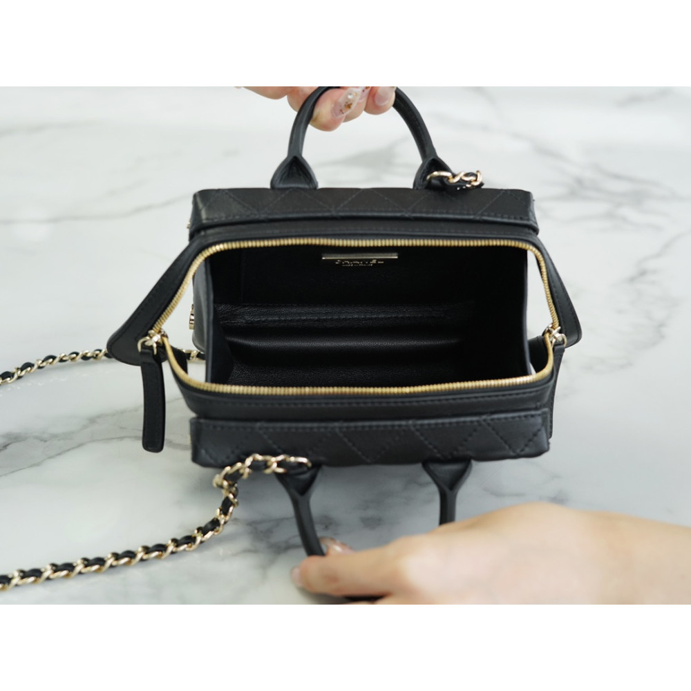 CHANEL SMALL STUDDED SQUARE VANITY CASE CHANEL SMALL STUDDED SQUARE VANITY CASE